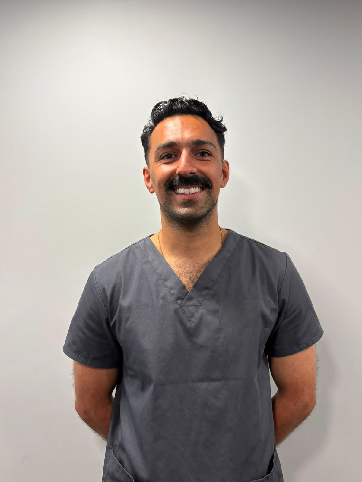 Dr Priyesh Surti, Dentist