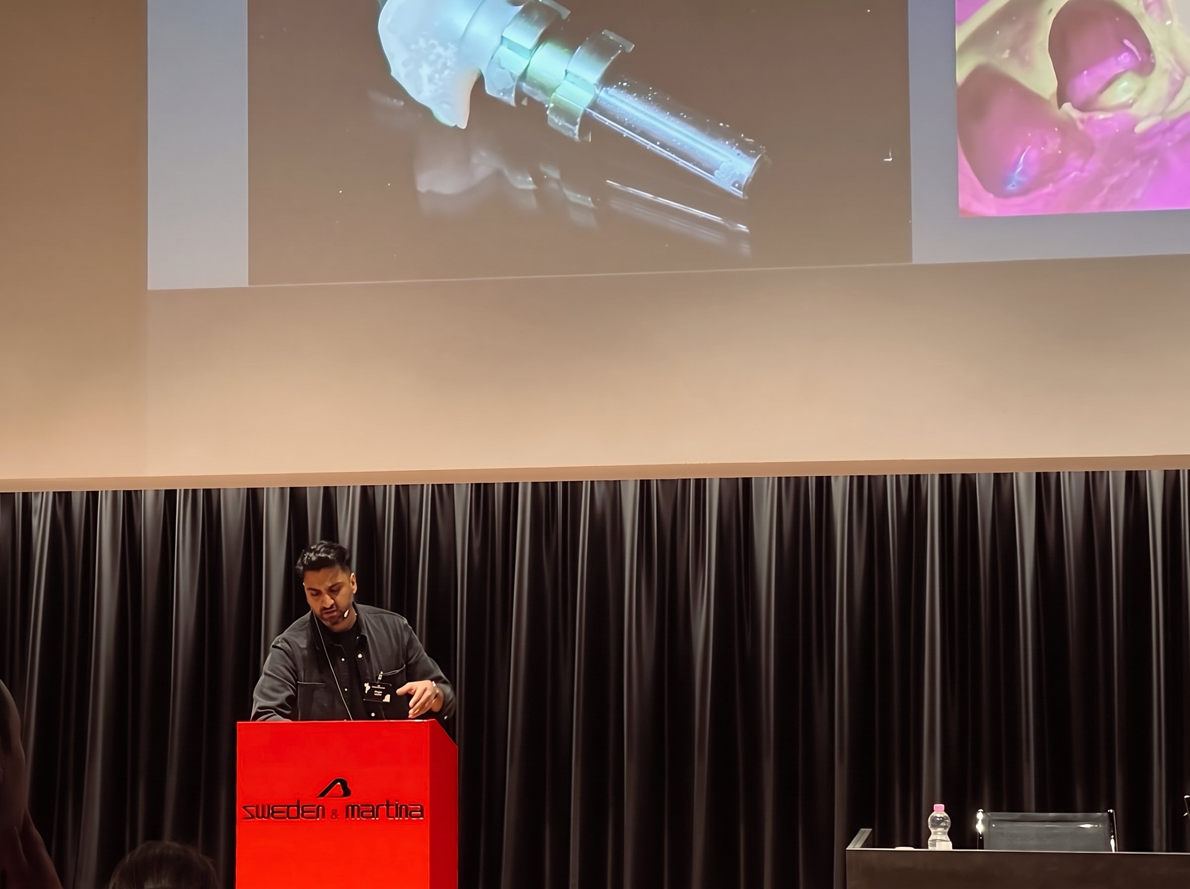 Dr Aman Bharti presenting at a dental conference